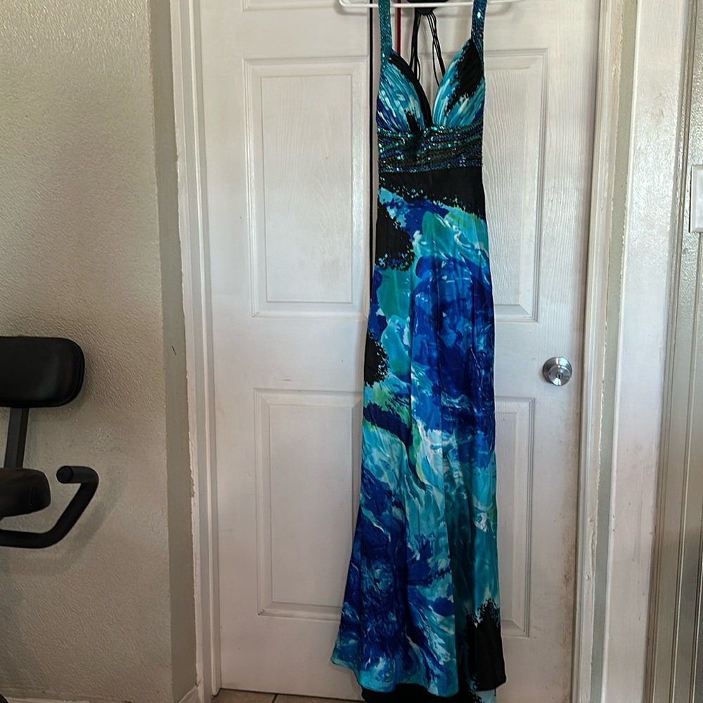 Woman’s dress open back blue and black size 8